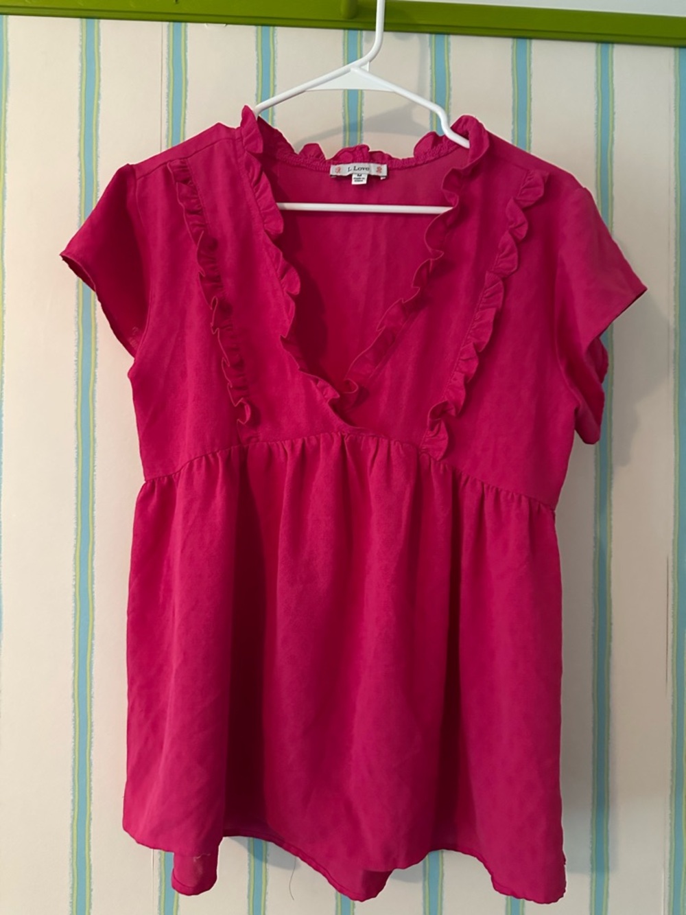 Hot Pink Ruffle V-Neck Short Sleeve Top runs slightly larger
